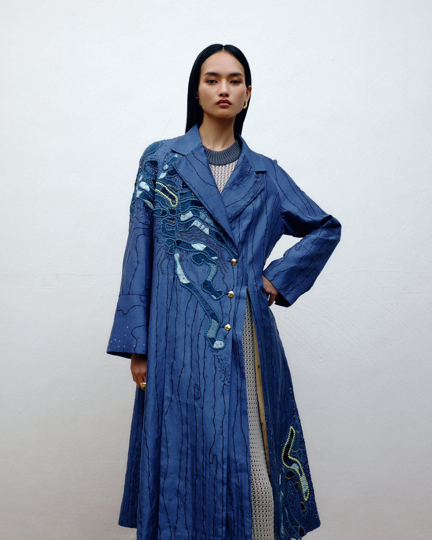 Contemporary longline silk outerwear rooted in artisan craft by Dulari