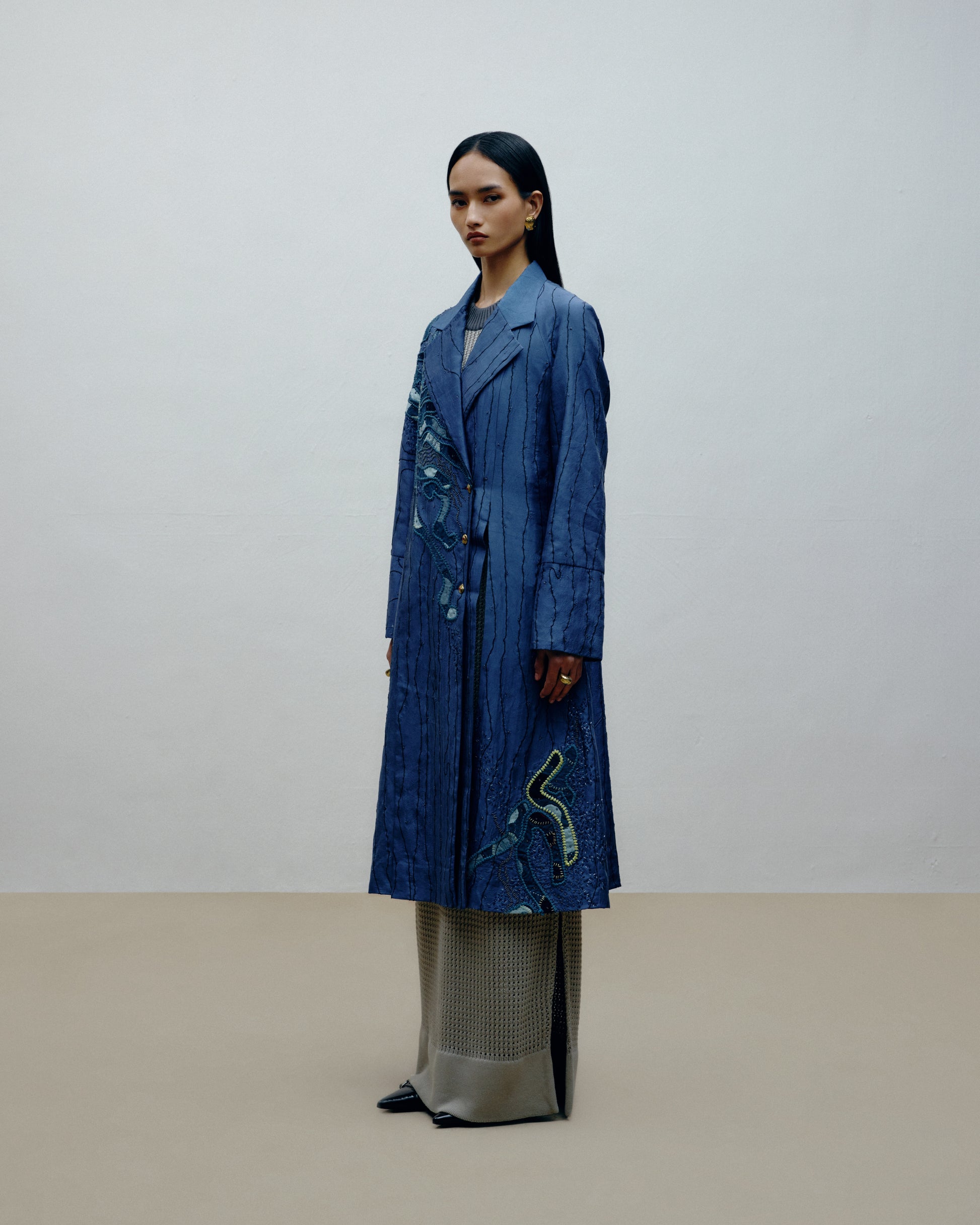 Luxury handcrafted silk coat in collectible womenswear by Dulari