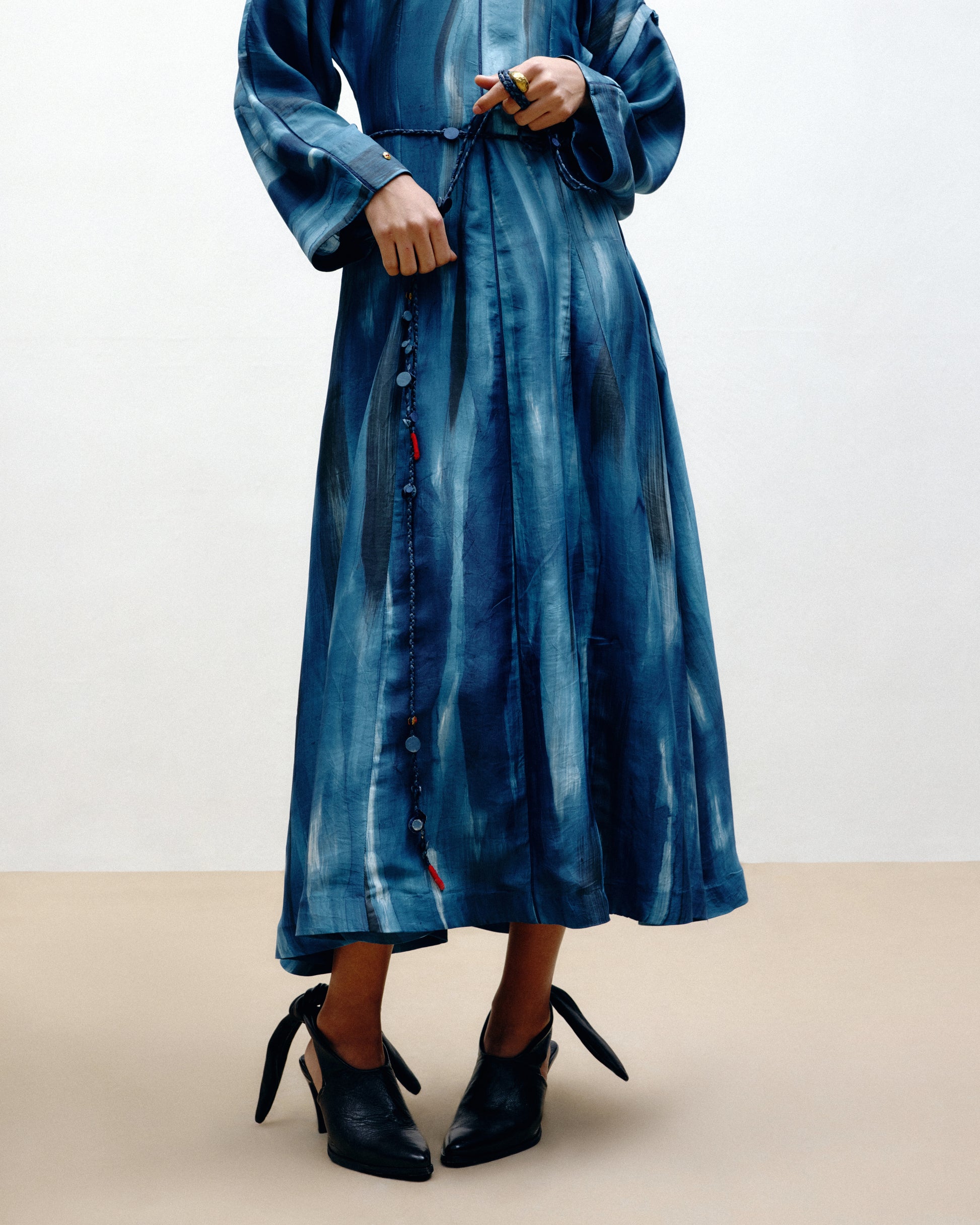 Flowing handcrafted silk dress in artisanal luxury fashion by Dulari